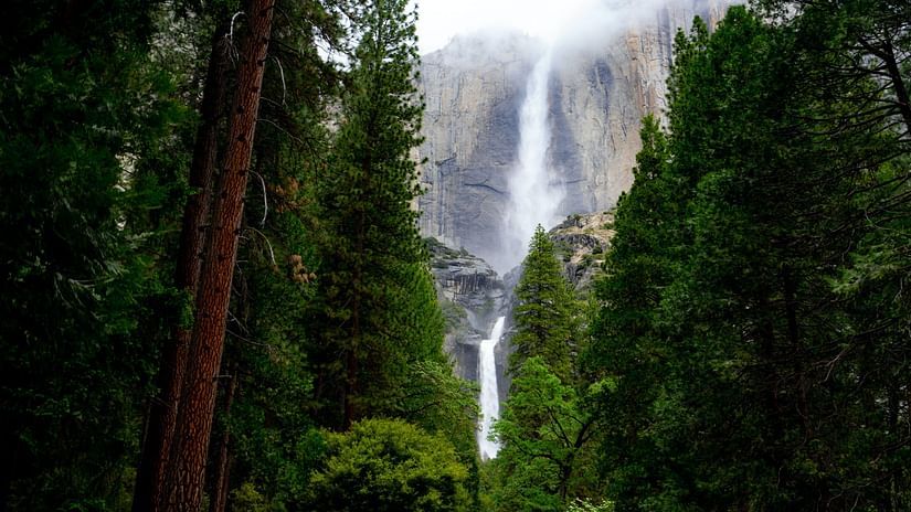 a waterfall cascading down a hill 3
