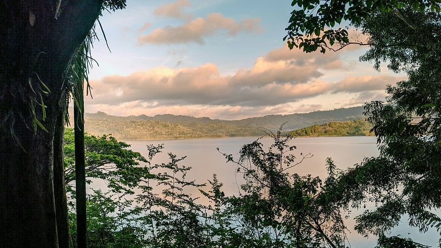 Serene lake view with a touch of golden sunset.