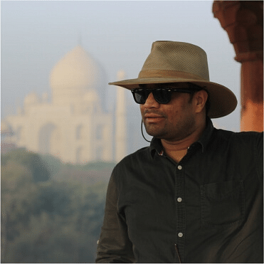 Photo of Udit with the Taj Mahal in the backdrop