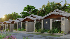 Water villas in Havelock at Symphony Palms Beach Resort And Spa featuring several villas against lush greenery.