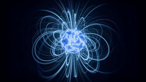 Magnetic field demonstration showing electric field lines around a glowing sphere.