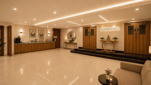 Foyer area at Tulip Inn, Hoodi Whitefield, Bengaluru, featuring wooden doors, steps, a sofa, a table, and a food service counter.