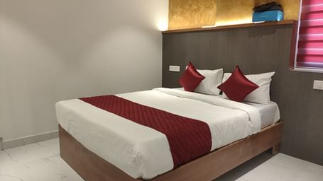 A view of the large bed at Hotel La Premier