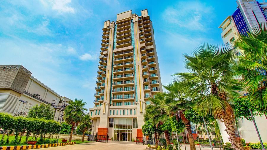 Facade view of the Entrance with trees at Rhythm Gurugram