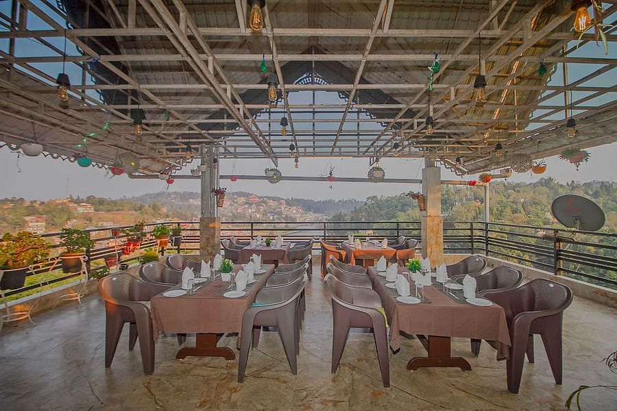 alt-text image of outdoor restaurant at  Mount Queen Hills resort
