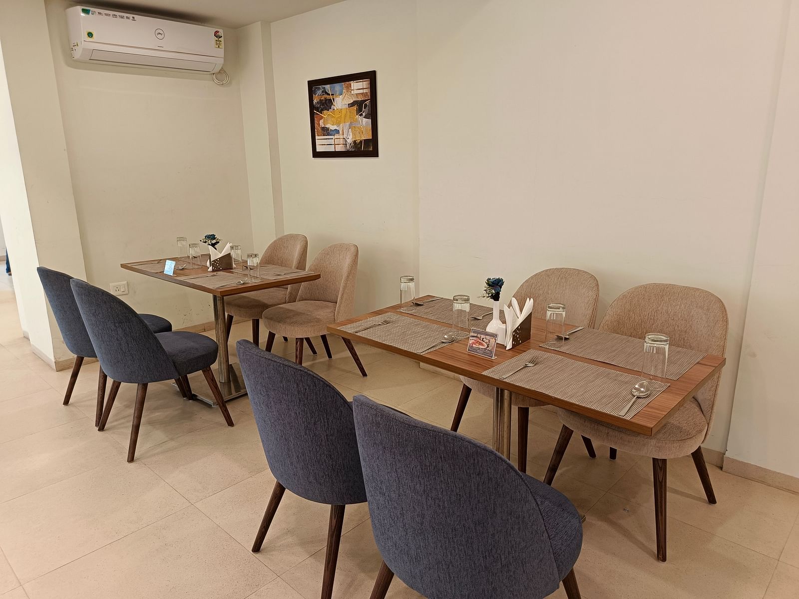 Seating arrangement inside the restaurant - Starlit Suites, Shirdi