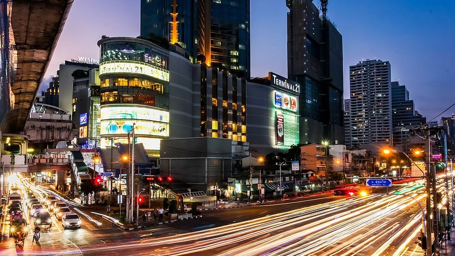 A wide angle view of Asok Montri Road - Night Hotel Bangkok