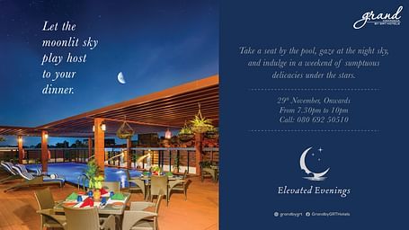 Banner for Moonlight Dinner at Grand Kakinada featuring a poolside restaurant with tables arranged under a clear sky with a moon and the banner says that the offer is valid from 29th November onwards