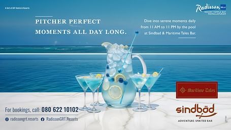 Promotional image for Radisson Blu Resort Temple Bay Mamallapuram, featuring a pitcher and glasses of blue cocktails of Sindbad & Maritime Tales Bar