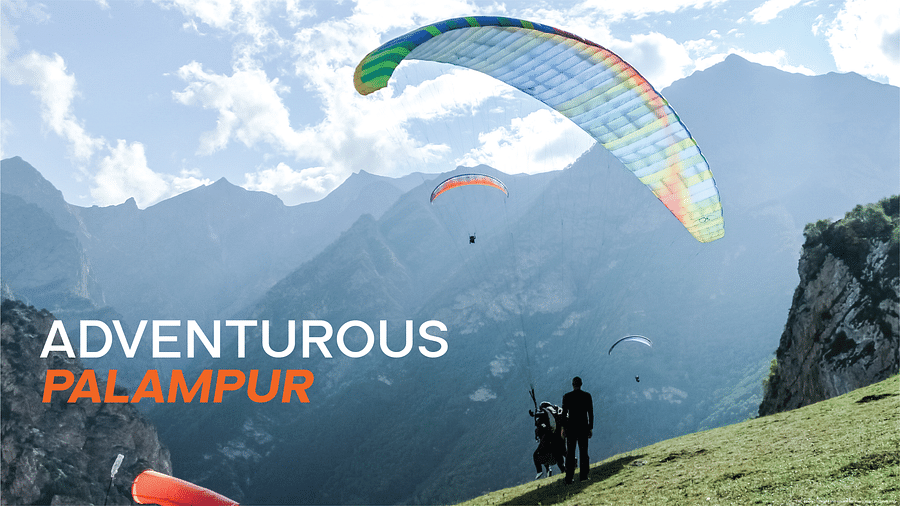 Cover page of Adventurous Palampur featuring thrilling paragliding over scenic mountains and lush landscapes.