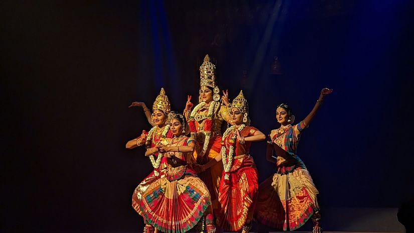 a group of women performing the south indian dance of bharatanatyam