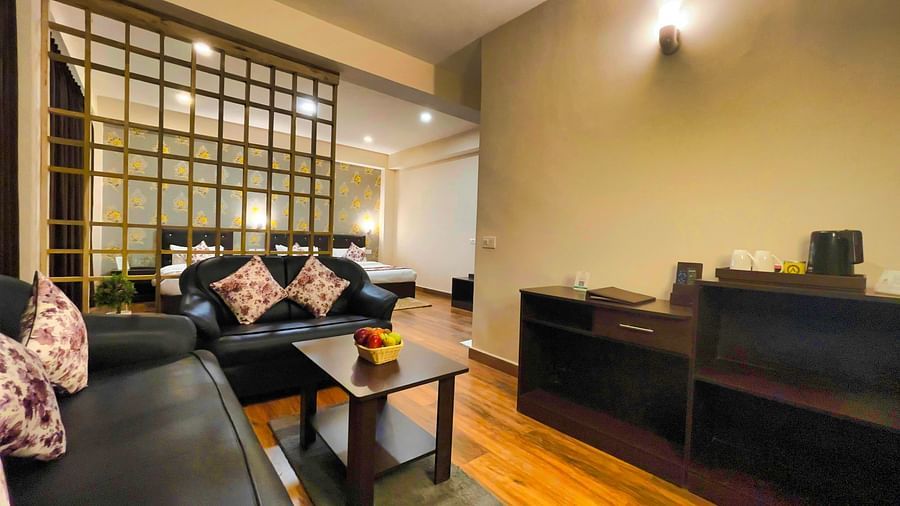 Dream Villa Retreat, Pelling - Interiors of the Suite with sofas and a tv cabinet