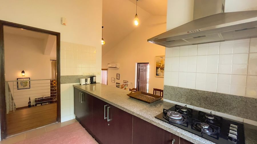 kitchen with a stove at El Benito Goa