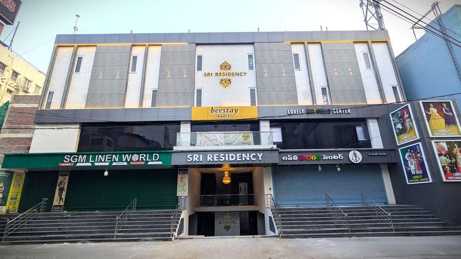 Exterior front view of Beestay Hotels with clear signage at Beestay Hotels, Rajahmundry.