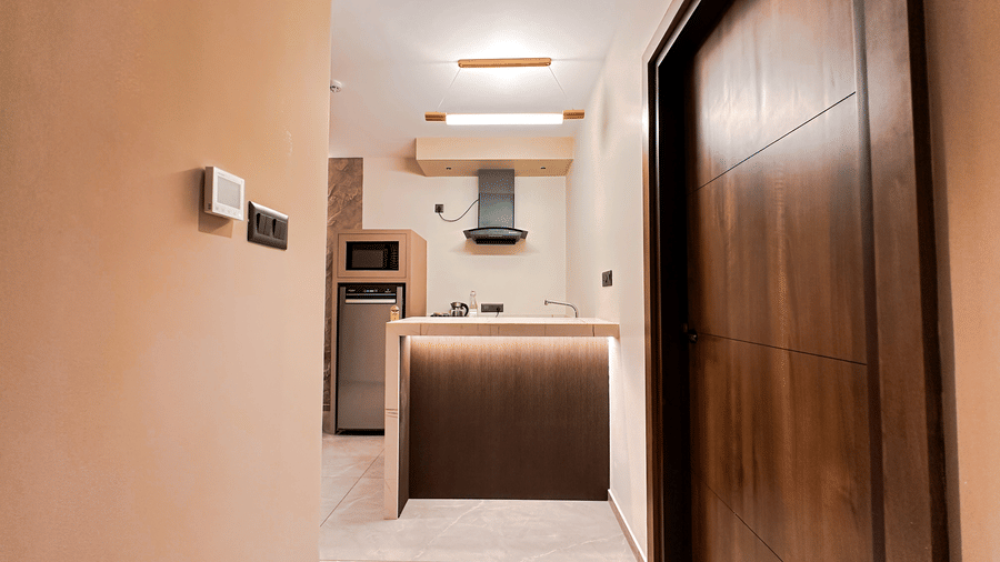 Front view of the kitchenette from the entrace of the Apartment Suite of F Hotels, Bengaluru.