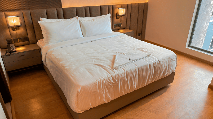 A close-up shot of the double bed in the Executive Room at F Hotels, Bengaluru.