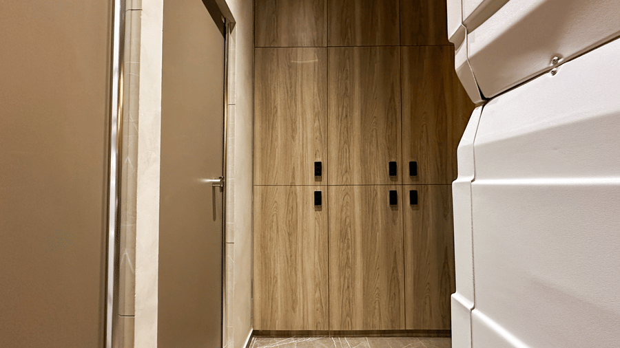 The shared wardrobe or storage area beside the private pods at F Hotels, Bengaluru.