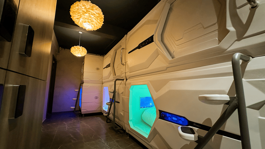 Exterior of the pods at F Hotels, Bengaluru, with ample of walking space outside it.