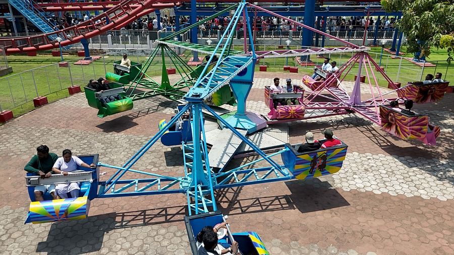 Amusement park ride with people on it