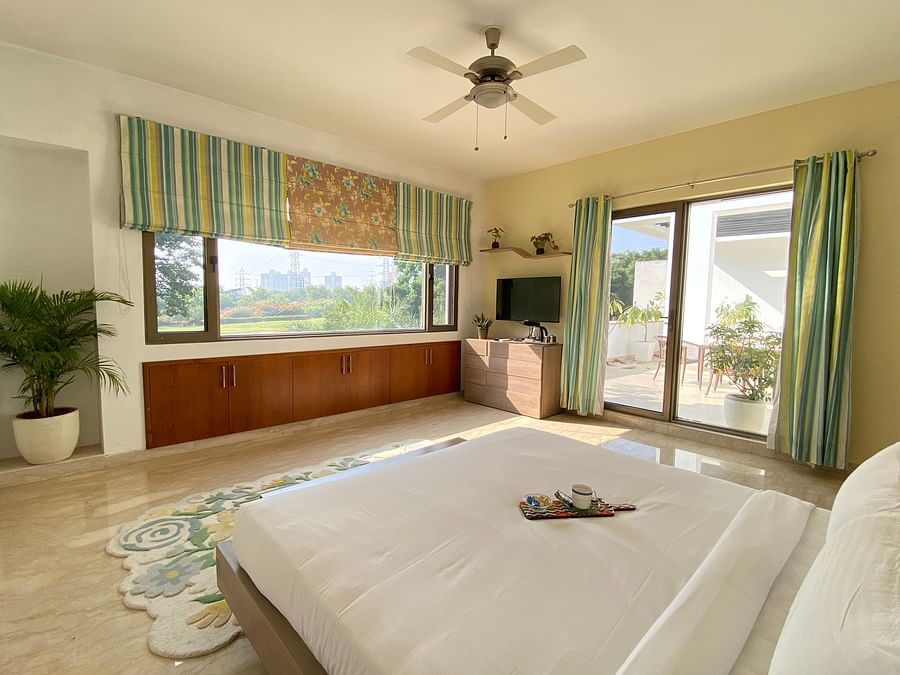 An overview of a bedroom inside one of the villas - Karma Lakelands.