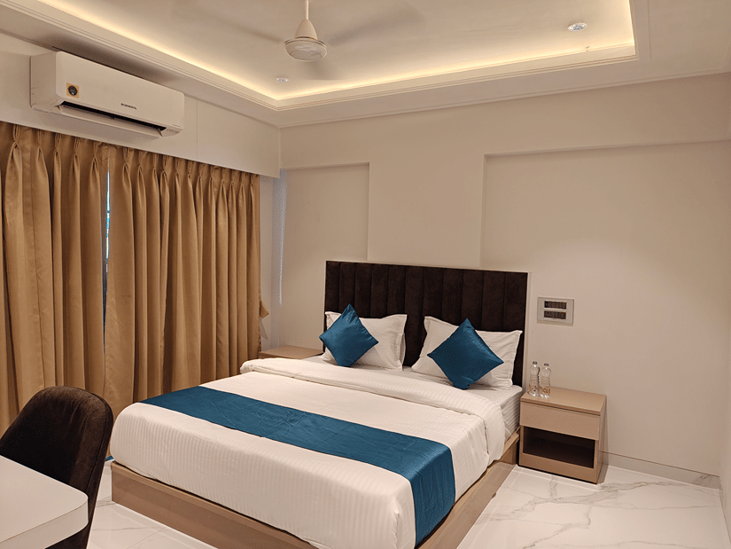 King bedroom in a serviced apartment at Home2 Residency, Mumbai Airport