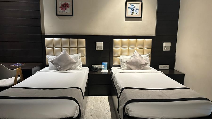a view of twin beds of Colony Twin Bed Room at Wonder country club resort