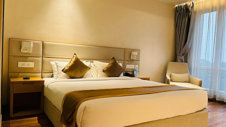 a view of a king bed of Executive King bed room at Wonder country club resort