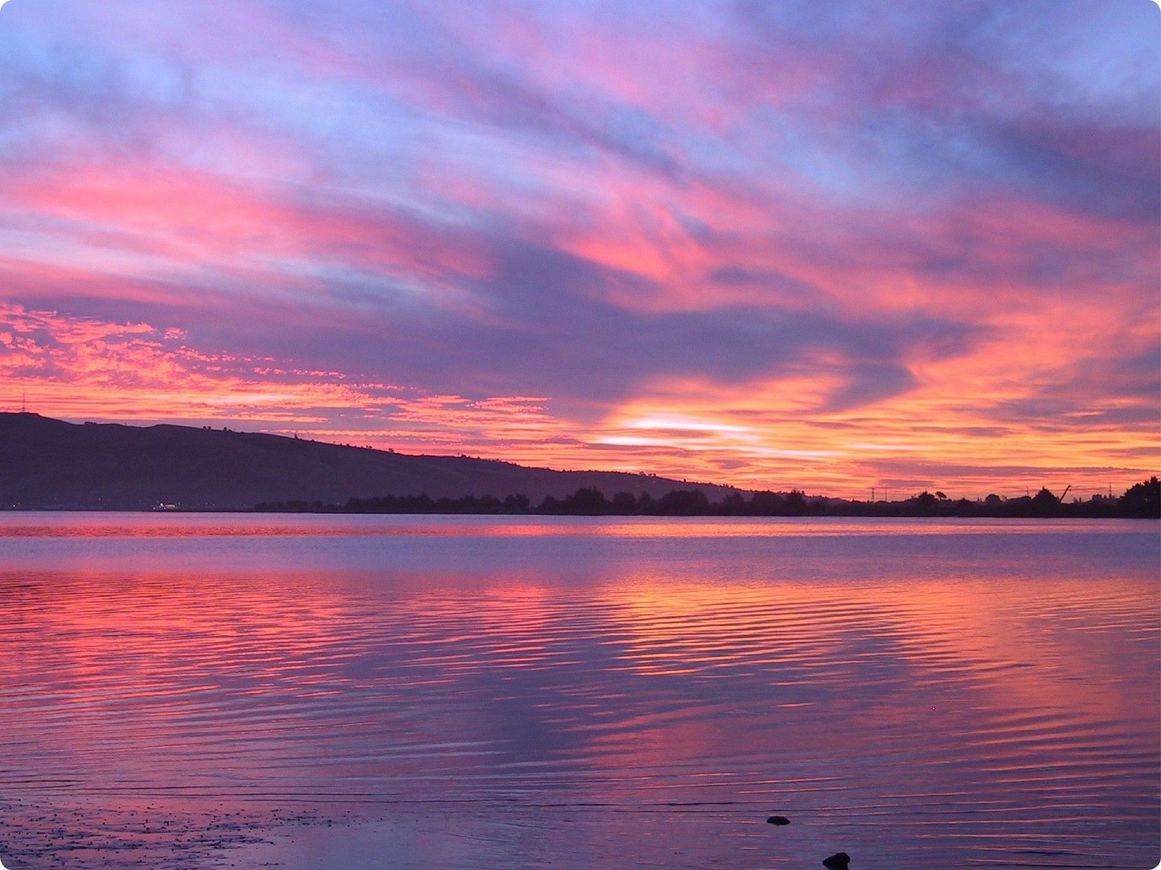 Experience beautiful sunsets at the river at The Serai Kabini 