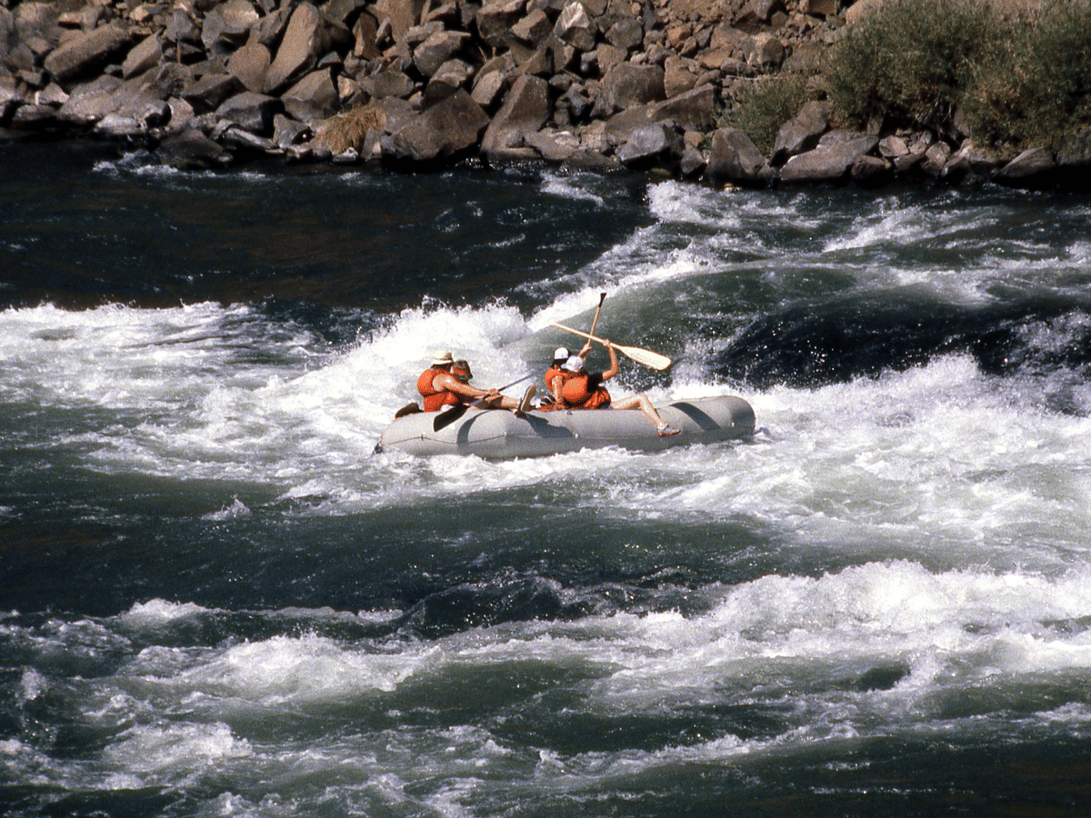 A raft running whitewater on the Ganga at Rishikesh