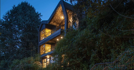 A sneak peak of cottage which is set around the trees | Kavya Resort and Spa, Nagarkot