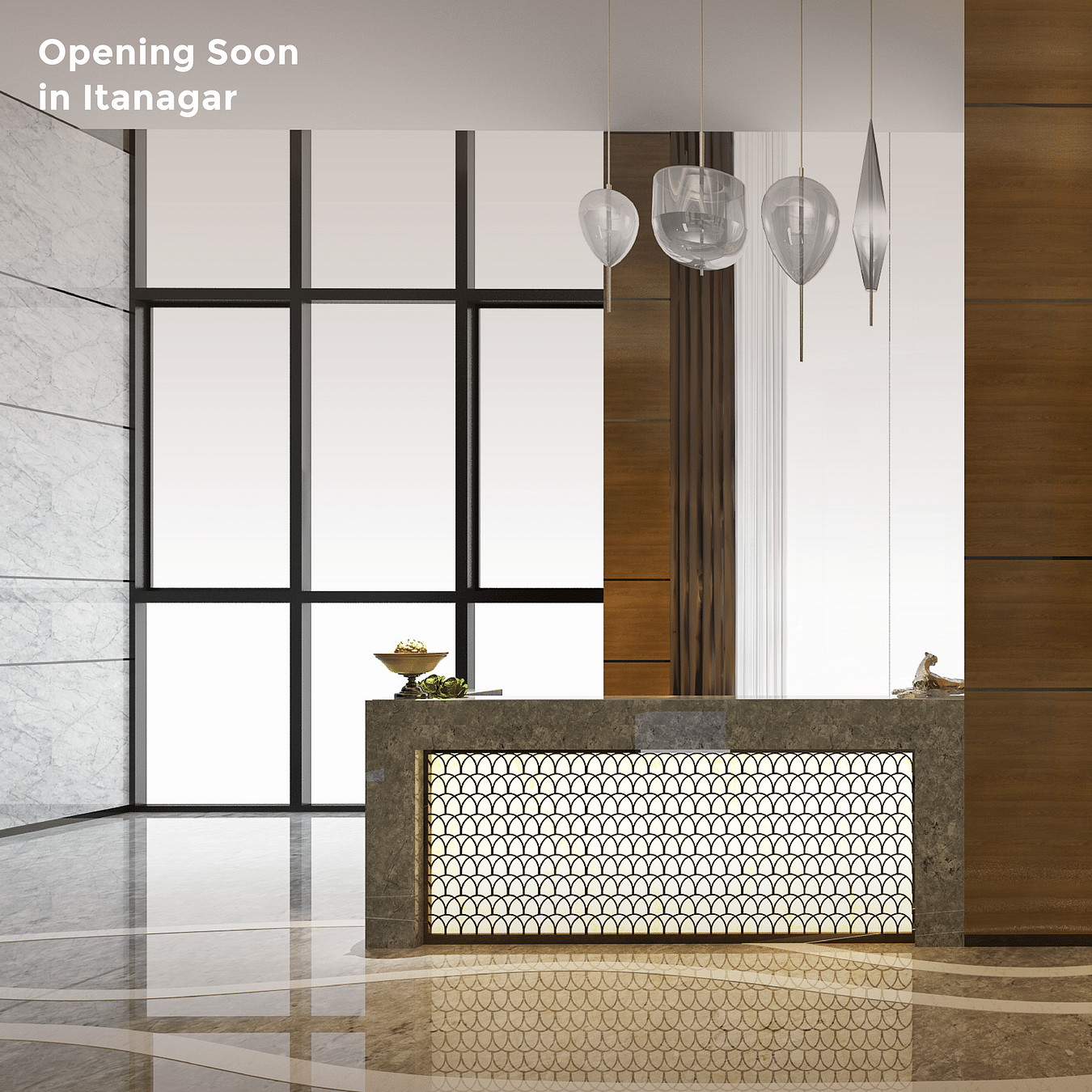 An image of a well-lit reception desk with decorative pieces hanging from the ceiling as the text says 'Opening Soon in Itanagar'