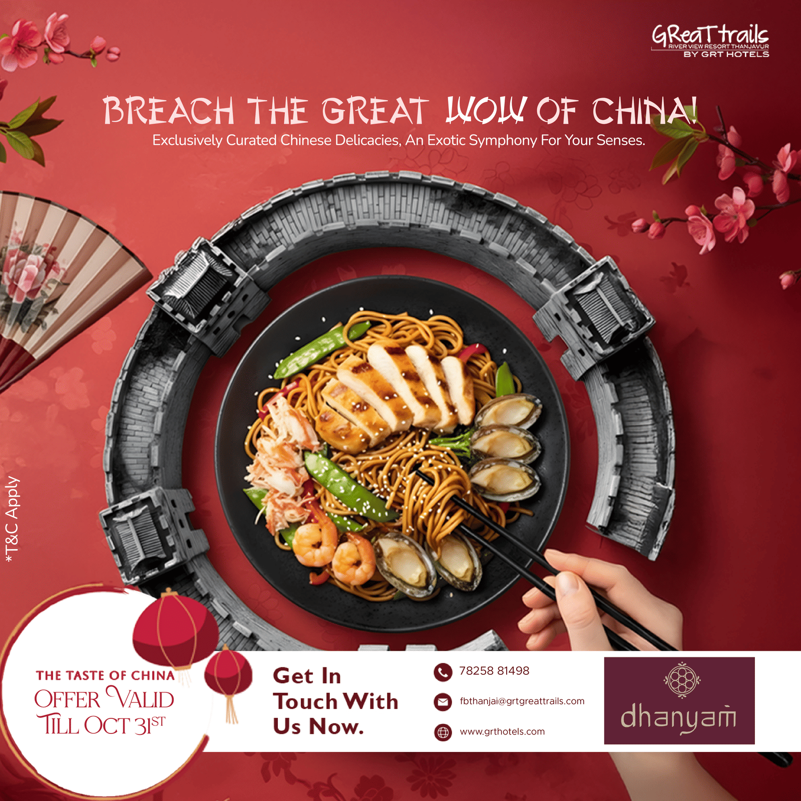 A plate of noodles with chicken, prawns, clams, and vegetables on a black plate, framed by the Great Wall replica at GReaT trails River View Resort Thanjavur by GRT Hotels.