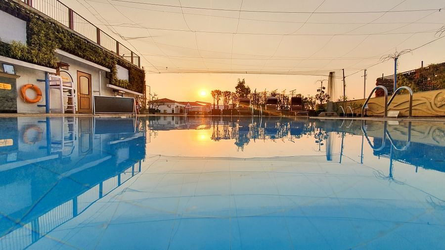 sunset view from our outdoor swimming pool at the orchid hotel mumbai