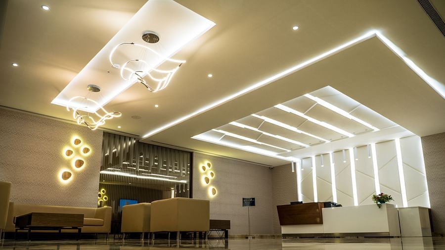 Lobby area with comfortable seating at Grand Ashok, Thanjavur.