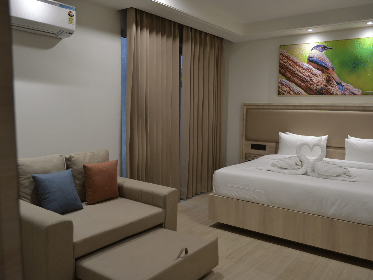 A deluxe room at Signum Tathastu Boutique Hotel, Haridwar