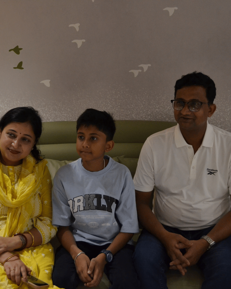 A family of guests seated together in their room at Signum Tathastu Boutique Hotel, Haridwar