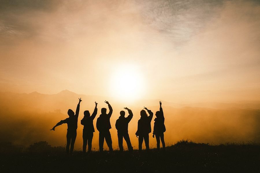 silhouette of a group of people partying
