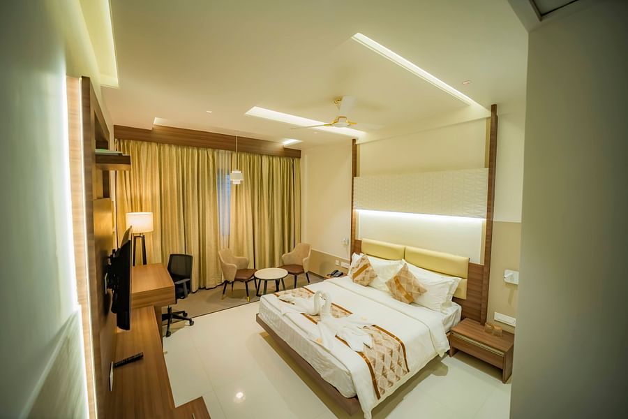 A full view of double Bed in the Executive Room With Breakfast at Kyriad Prestige, Ilkal