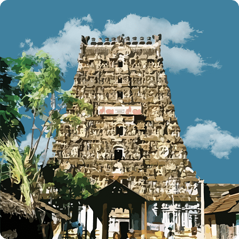 A traditional temple gopuram features faded stone reliefs surrounded by green trees and a blue sky.