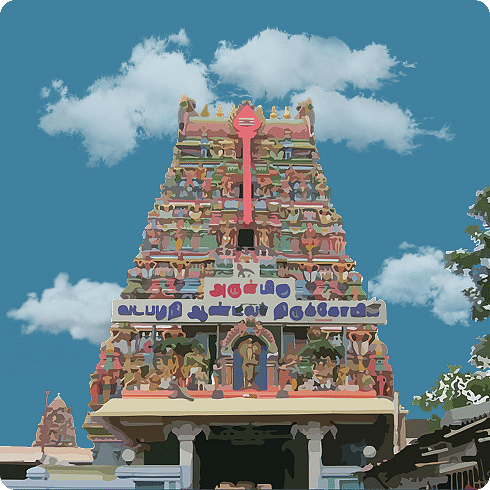 A bright gopuram with symmetrical sculptures and divine figures, typical of Tamil temple architecture.