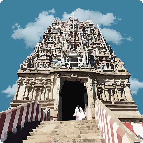A majestic stone gopuram towers over wide steps, standing tall against a bright blue sky with scattered clouds.