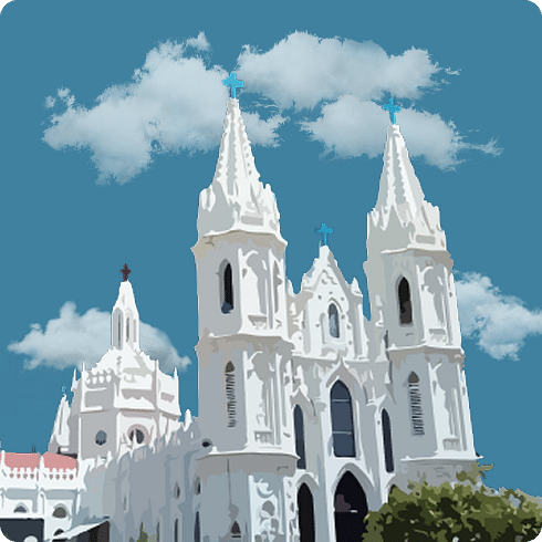 A white church with pointed spires shines under the clear sky, reflecting Gothic influences.