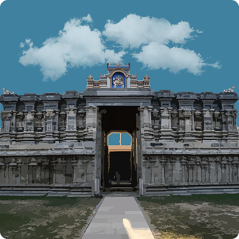 A large, grey stone temple entrance with a small gopuram against a blue, cloudy sky.