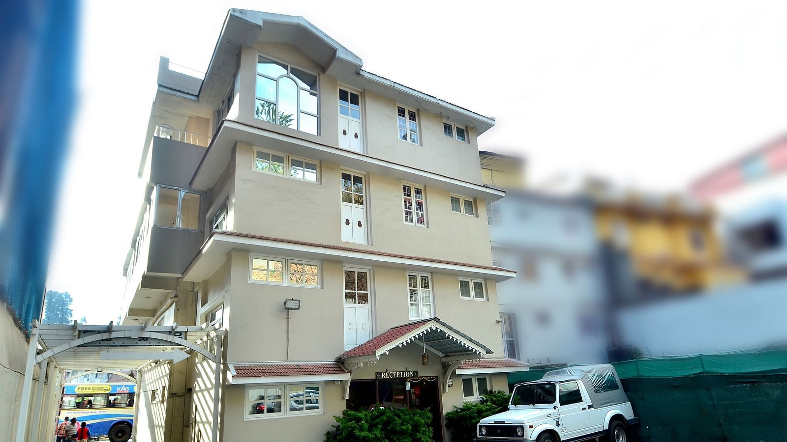 Facade of BN Tourist Home with a car parked in front of it.