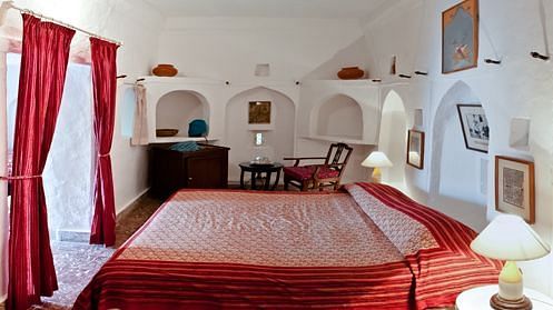 Bhawani Mahal - Fort View features regal interiors decorated in hues of red - Shankar Mahal offers a twin bed and several other amenities - Hill Fort-Kesroli
