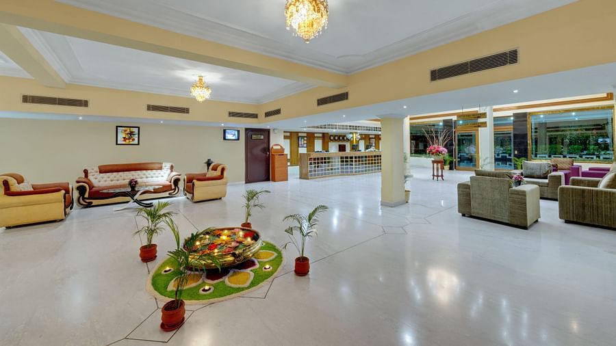 Waiting area with comfortable sofa at SRM Hotel Maram Malai Nagar Chennai