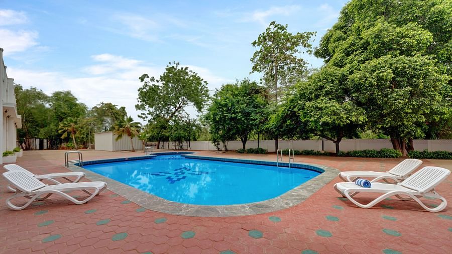 Image of swimming pool at SRM Hotel Tiruchirappalli- Hotel 