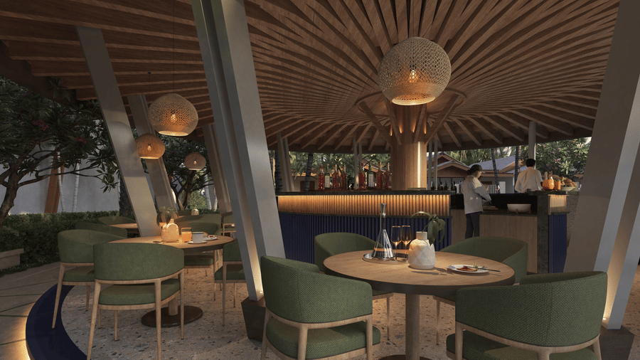 A dimly lit, tropical-themed bar at Symphony Palms Beach Resort And Spa, with woven light fixtures, green chairs, and a bar counter in the background.