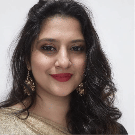 Female team member portrait at Pride Hotels Group.