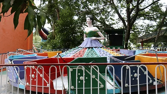 Kids’ merry-go-round ride at Black Thunder with vibrant colors and whimsical character design